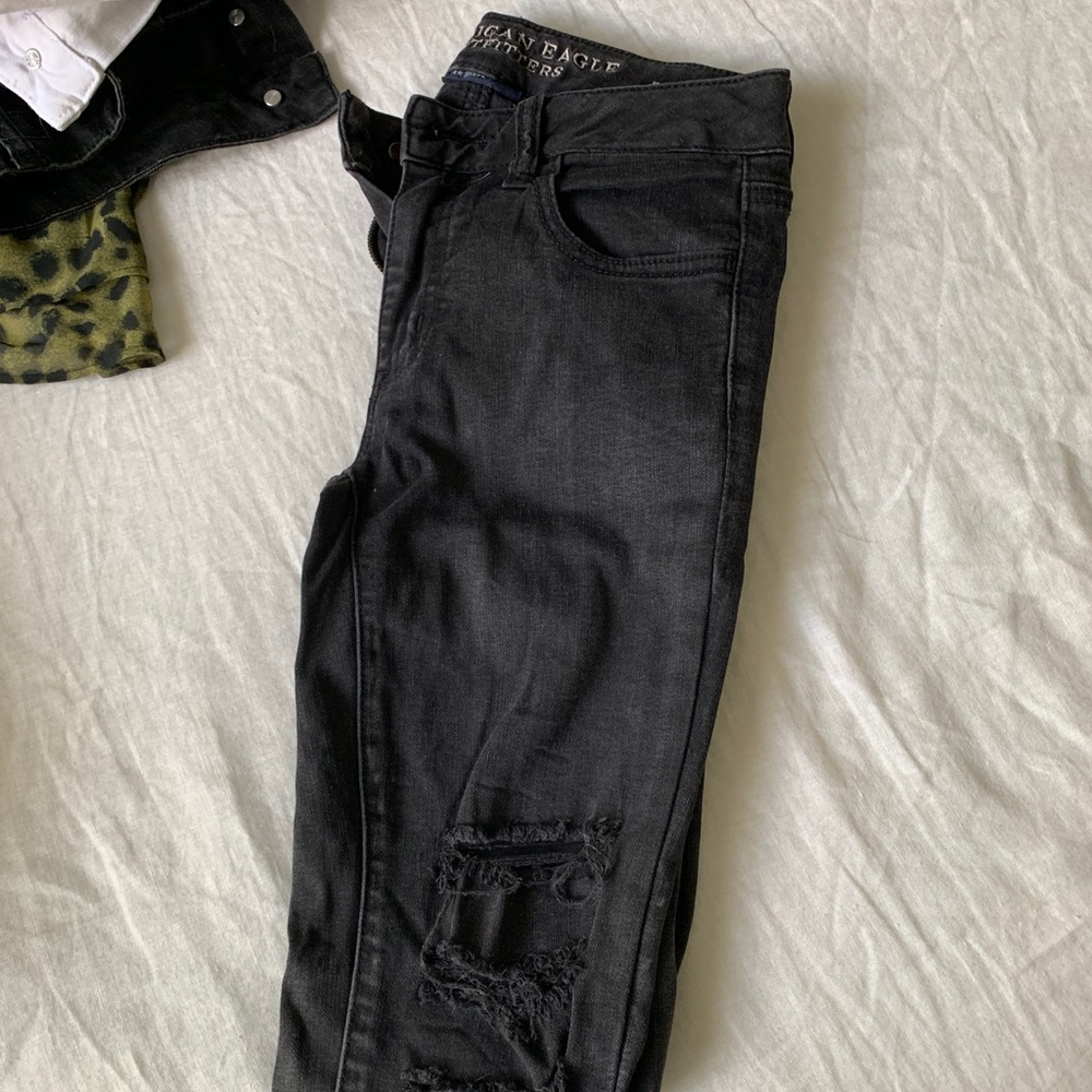 black ripped jeans
